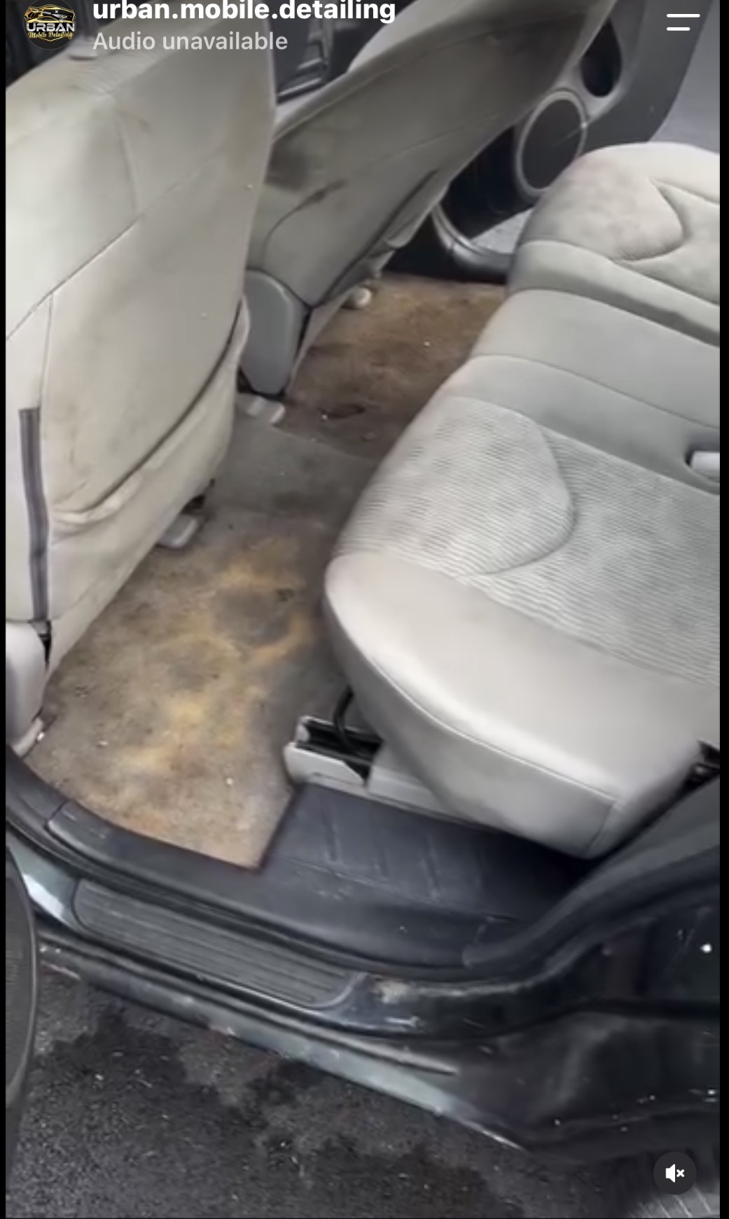Vehicle rear seat and carpet before detailing